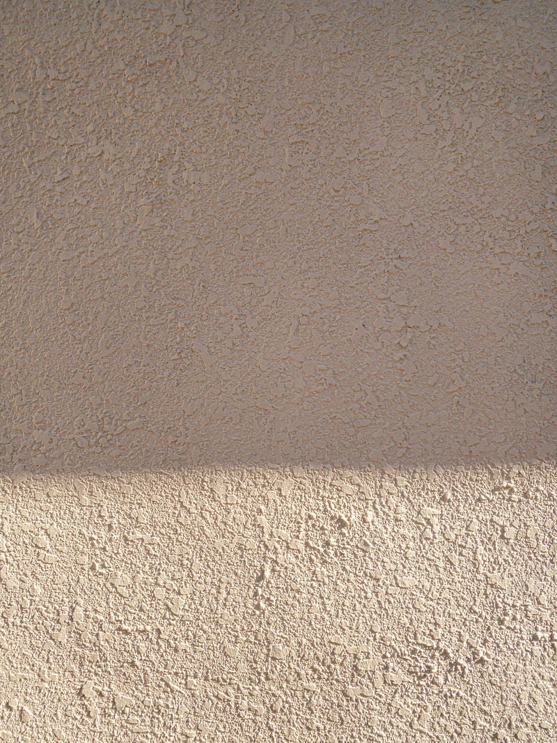「モルタルに出来た壁（テクスチャ）」の写真