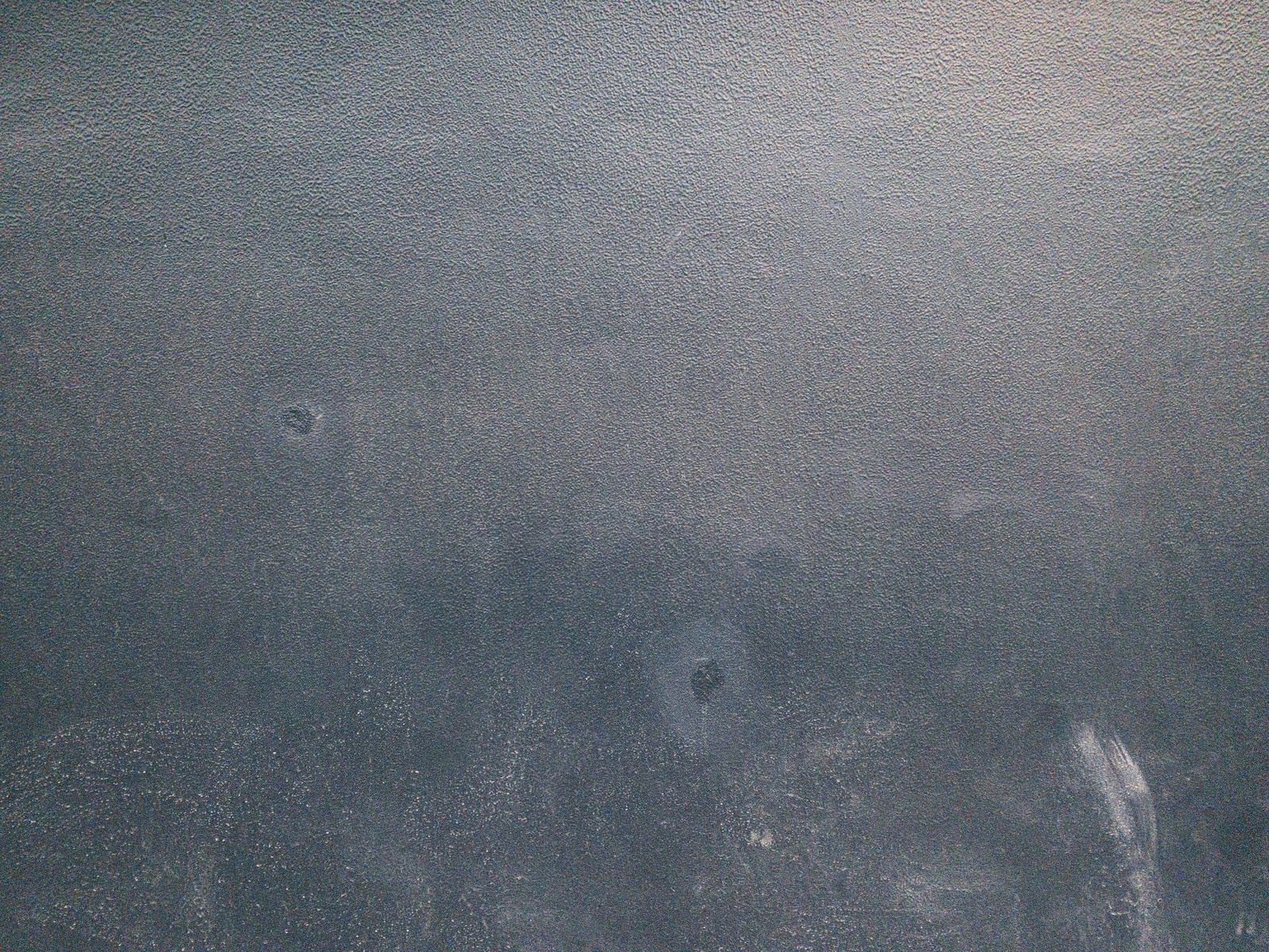 「汚れの付いたモルタル壁（テクスチャ）」の写真