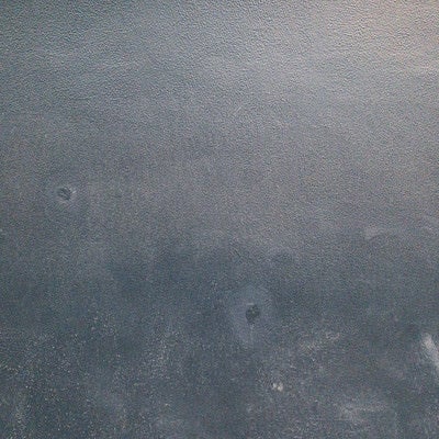 汚れの付いたモルタル壁（テクスチャ）の写真