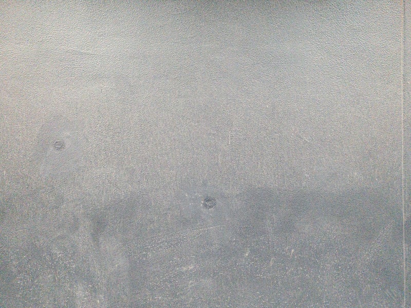 拭きムラ残るモルタル壁（テクスチャ）の写真