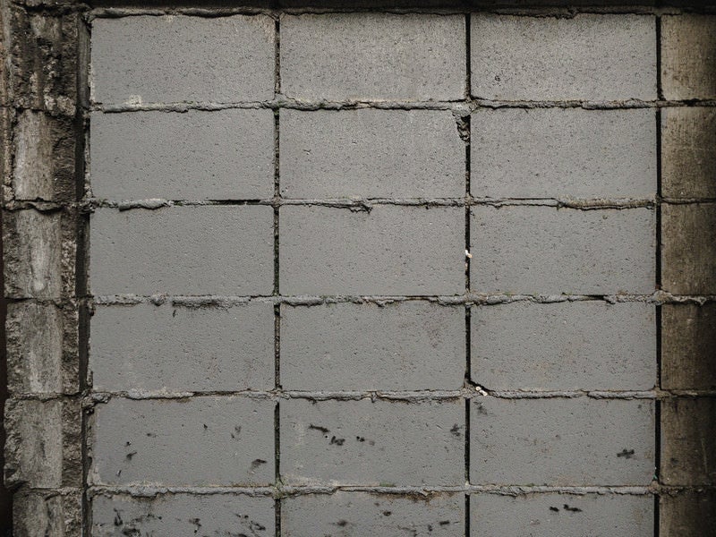 積まれたばかりのコンクリートブロック塀（テクスチャー）の写真