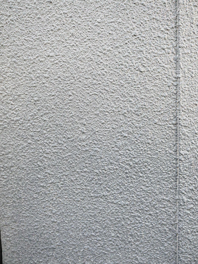 継ぎ目のあるモルタル壁（テクスチャ）の写真