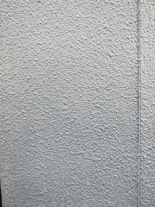 継ぎ目のあるモルタル壁（テクスチャ）の写真