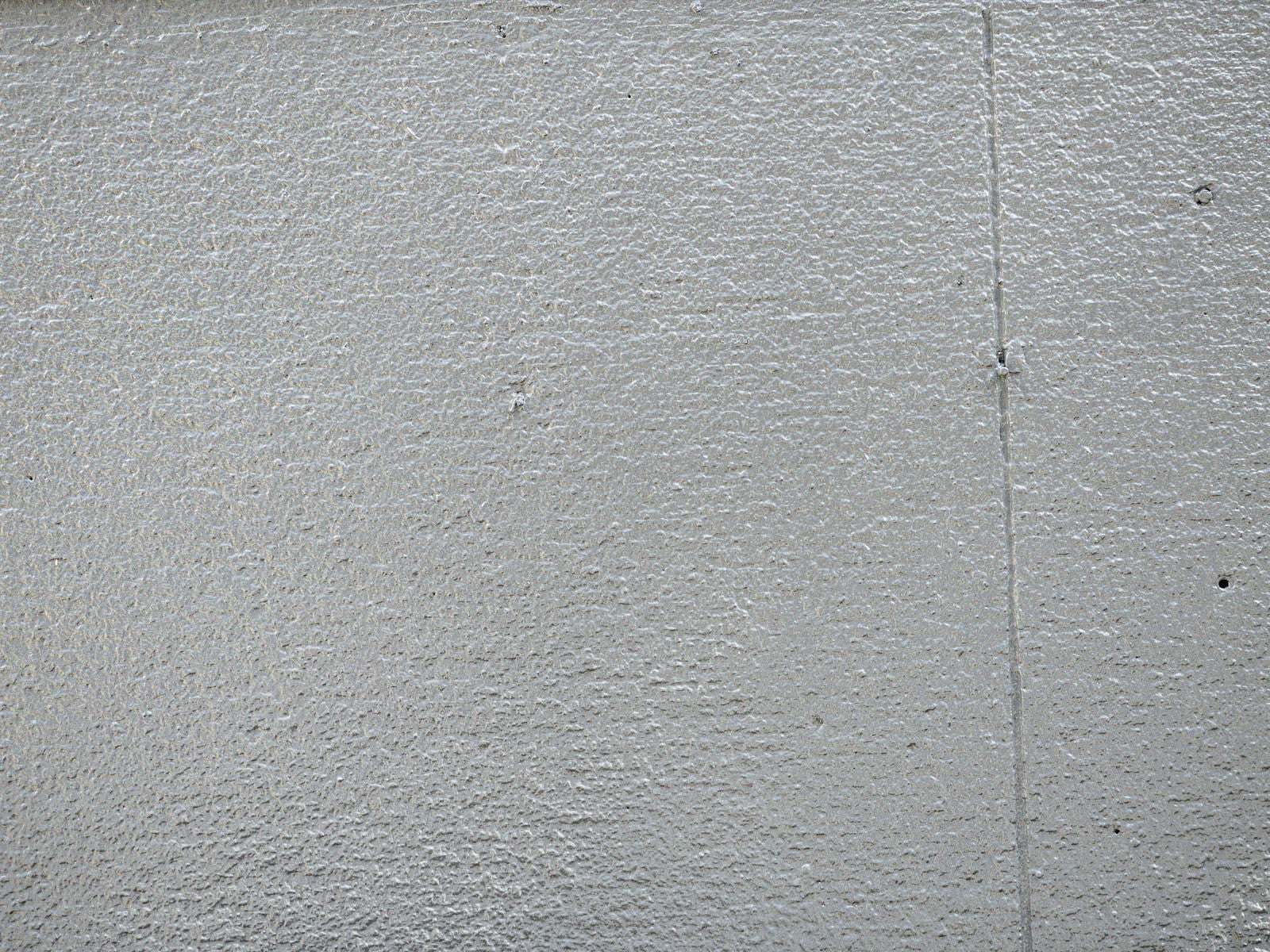 「一面塗装された壁（テクスチャー）」の写真