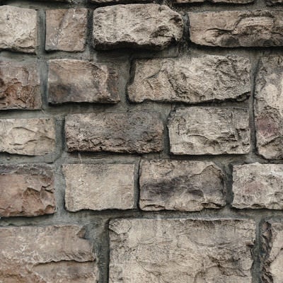 石材を積んだレンガ壁の写真