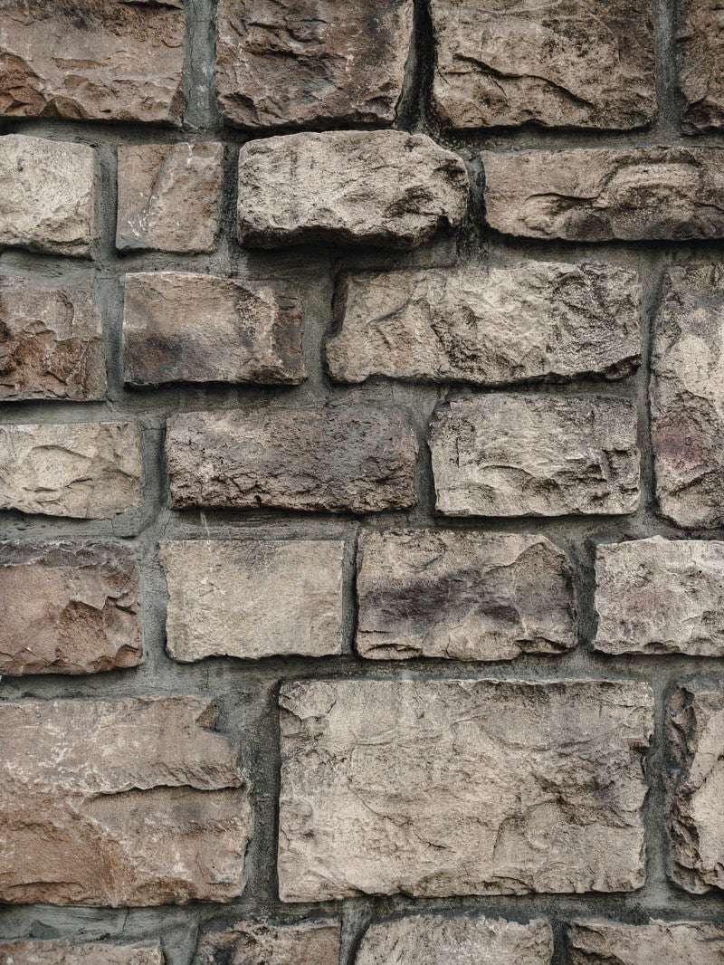 「石材を積んだレンガ壁」の写真