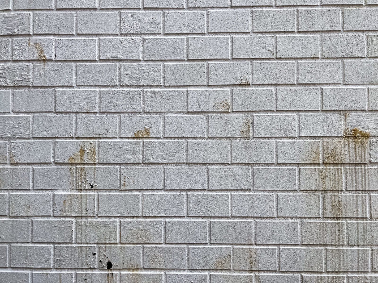 「茶色い汚れの付いた壁のテクスチャー」の写真