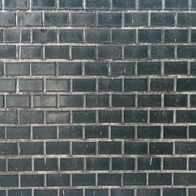 灰色のレンガ壁（テクスチャー）の写真
