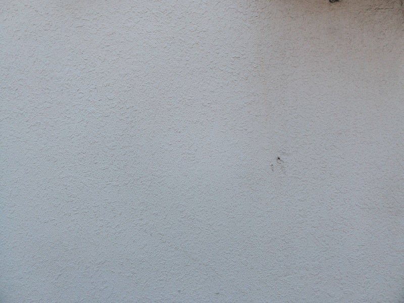 モルタル仕上げの外壁のテクスチャーの写真