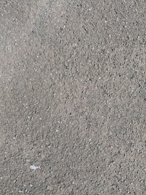 アスファルトの地面のテクスチャの写真