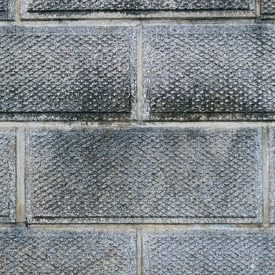 表面に模様のあるブロック塀のテクスチャーの写真