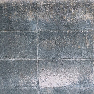 白華（はっか）したブロック塀のテクスチャーの写真