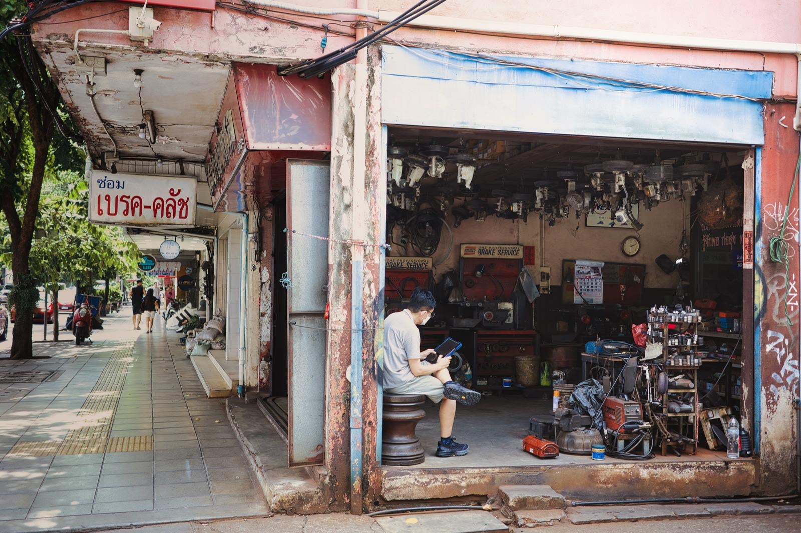 A Small Workshop Blending into the Alleyways of Bangkok - free stock photo