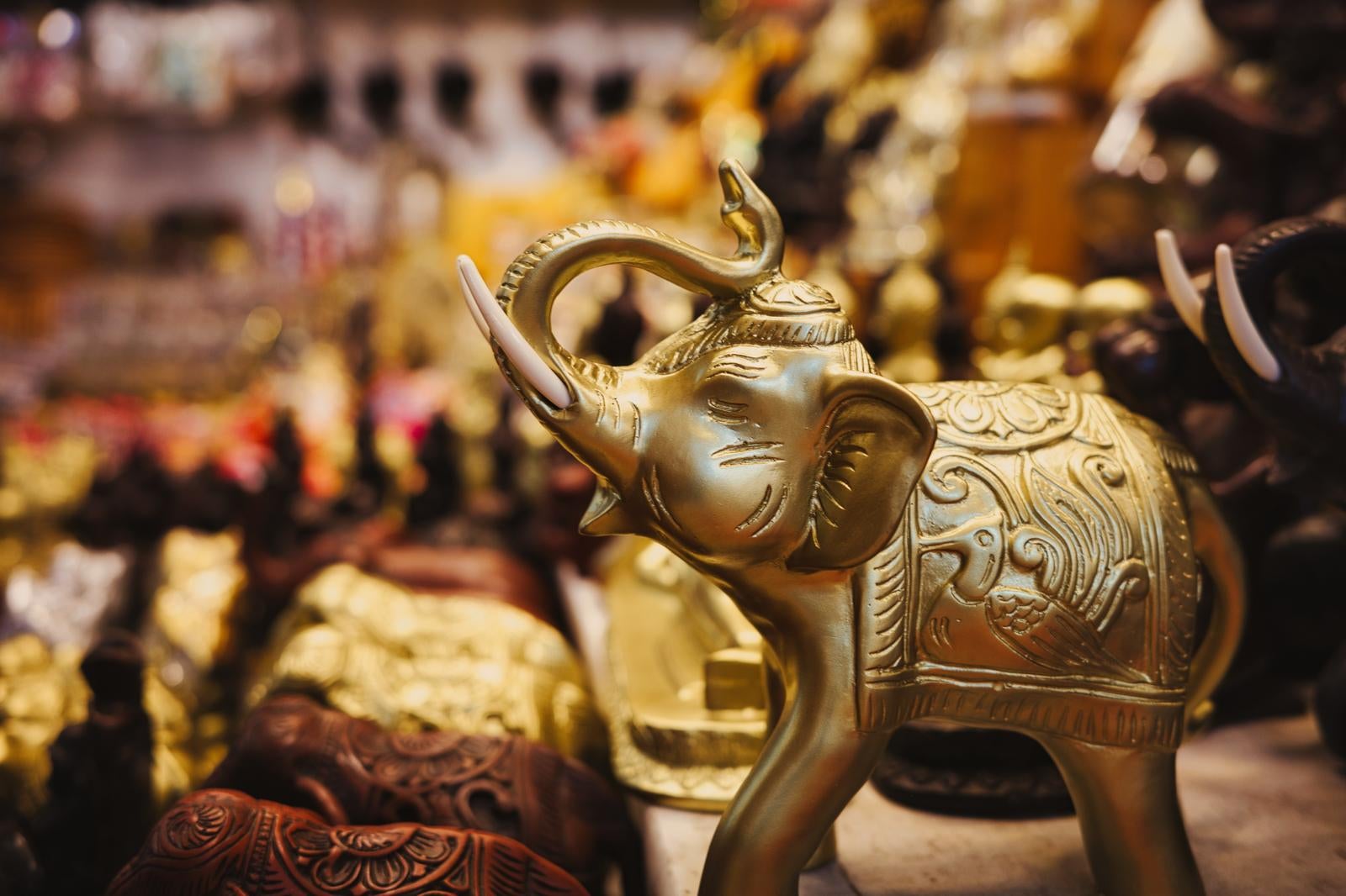 Golden Elephant Figurine with Raised Trunk - free stock photo