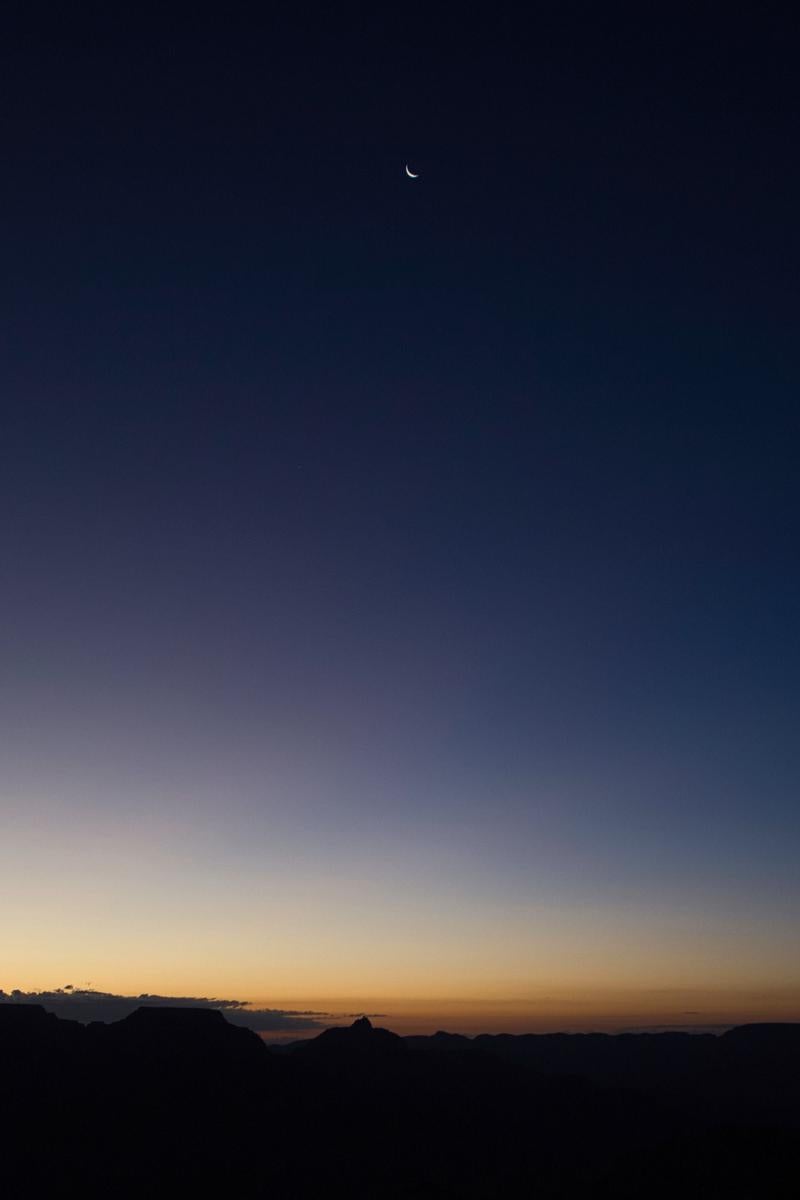 Crescent Moon Floating in the Dim Sky Above the Grand Canyon - free stock photo